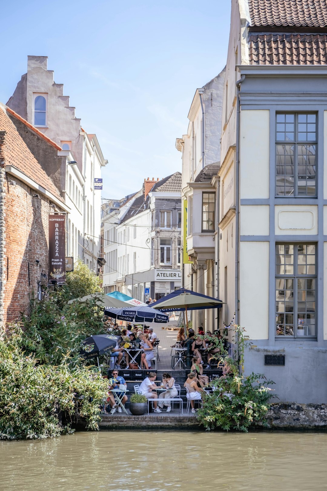Diverse professionals discussing around a table in Belgium